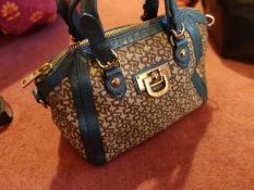 Used DKNY purse still got shine zip in perfect working order