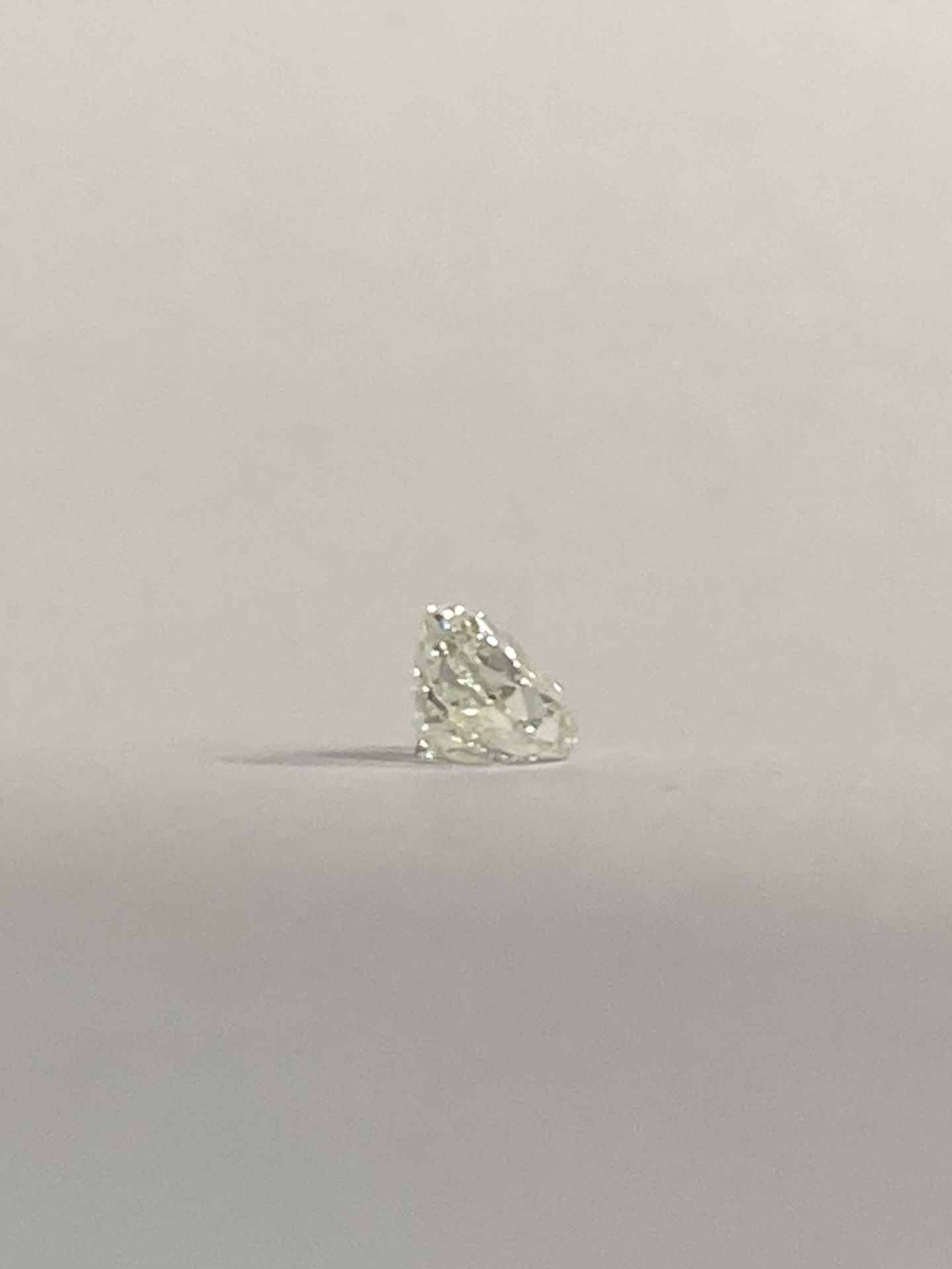 RRP £7,000 Cushion Modified Brilliant Cut 6.09X5.39X4.13 Mm , 1.04 Carat Natural Faint Yellow Green - Image 3 of 4