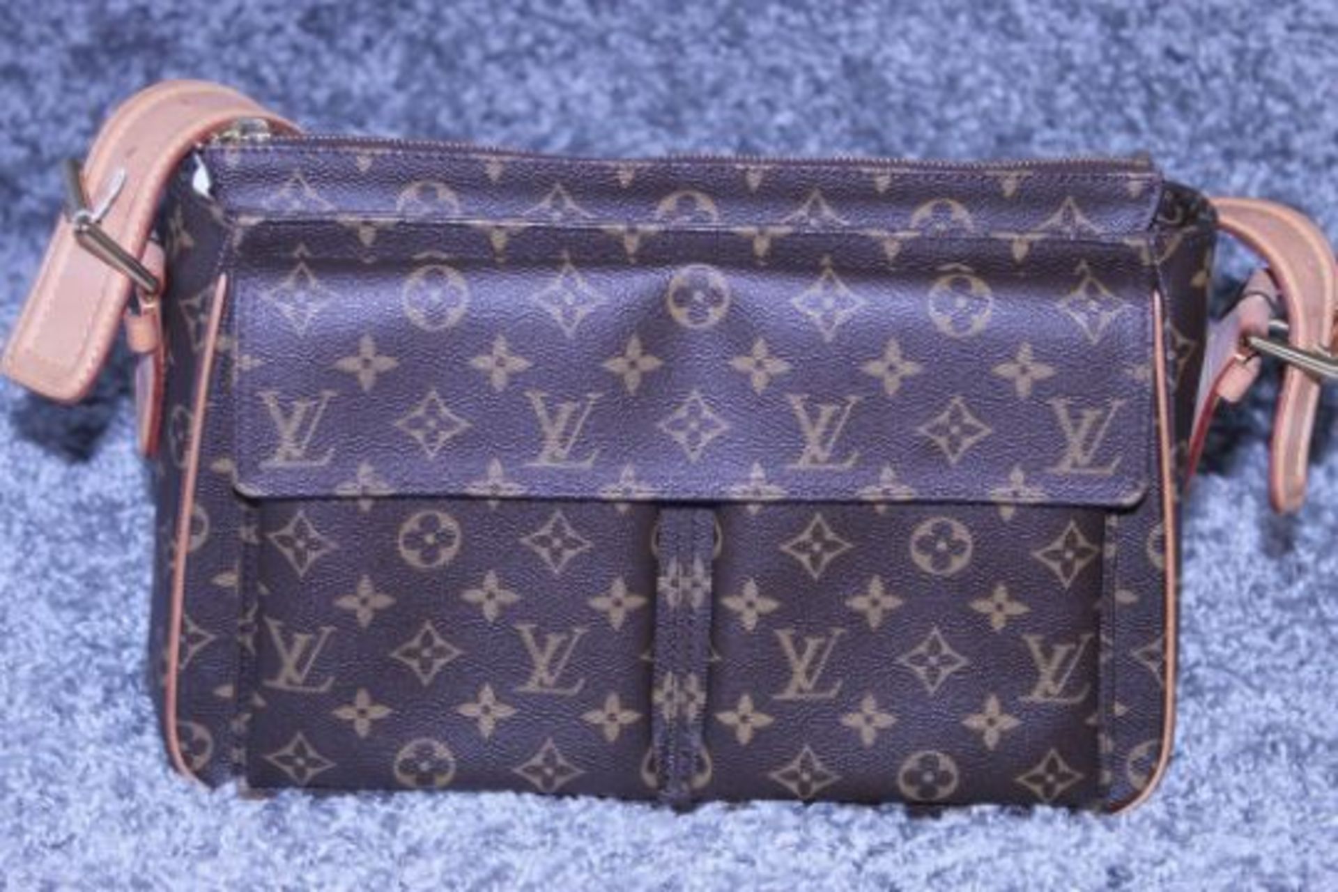 RRP £1700 Louis Vuitton Viva Cite Handbag In Brown Coated Monogram Canvas. Condition Rating A (