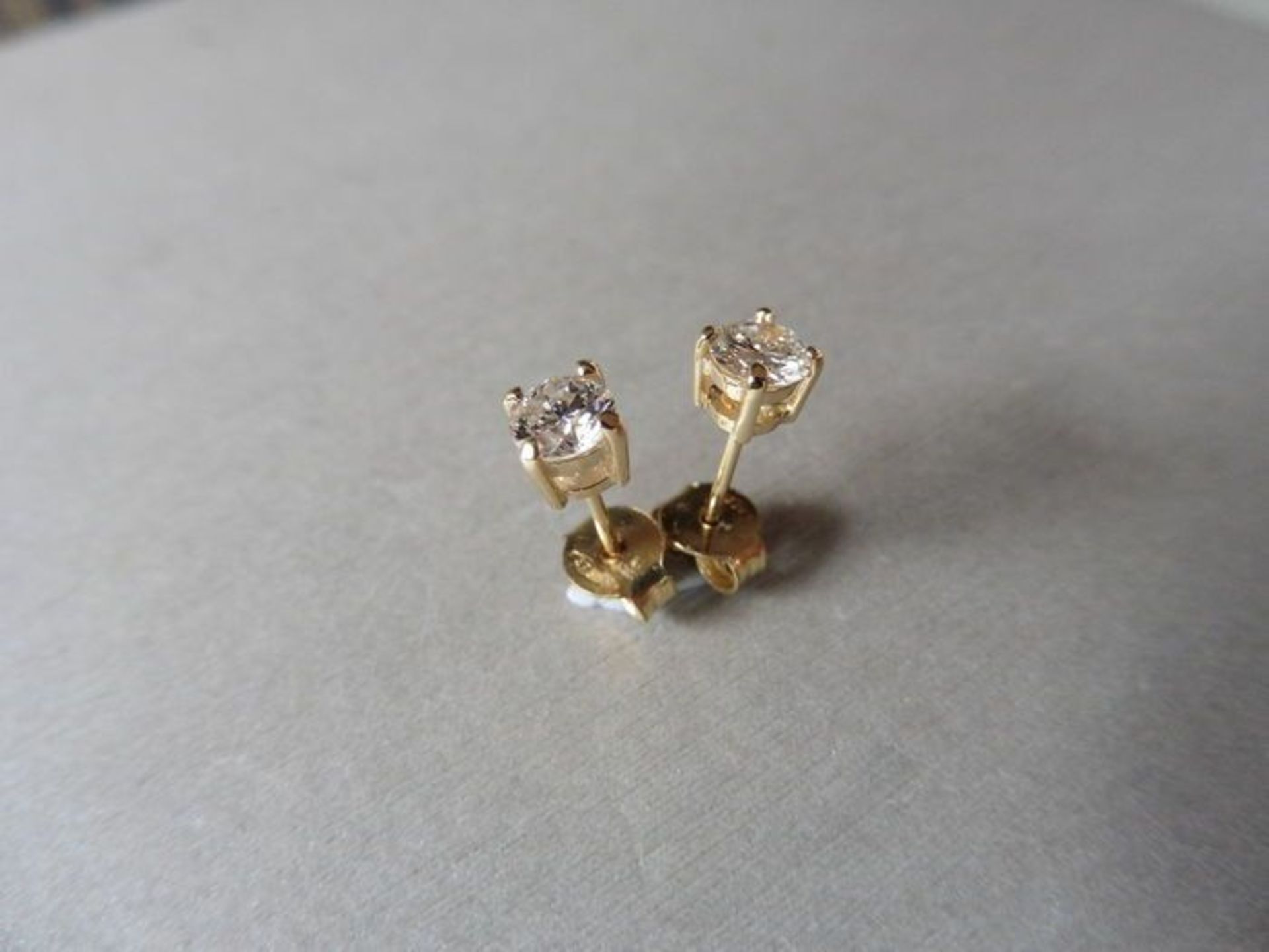 0.50ct Solitaire diamond stud earrings set with brilliant cut diamonds