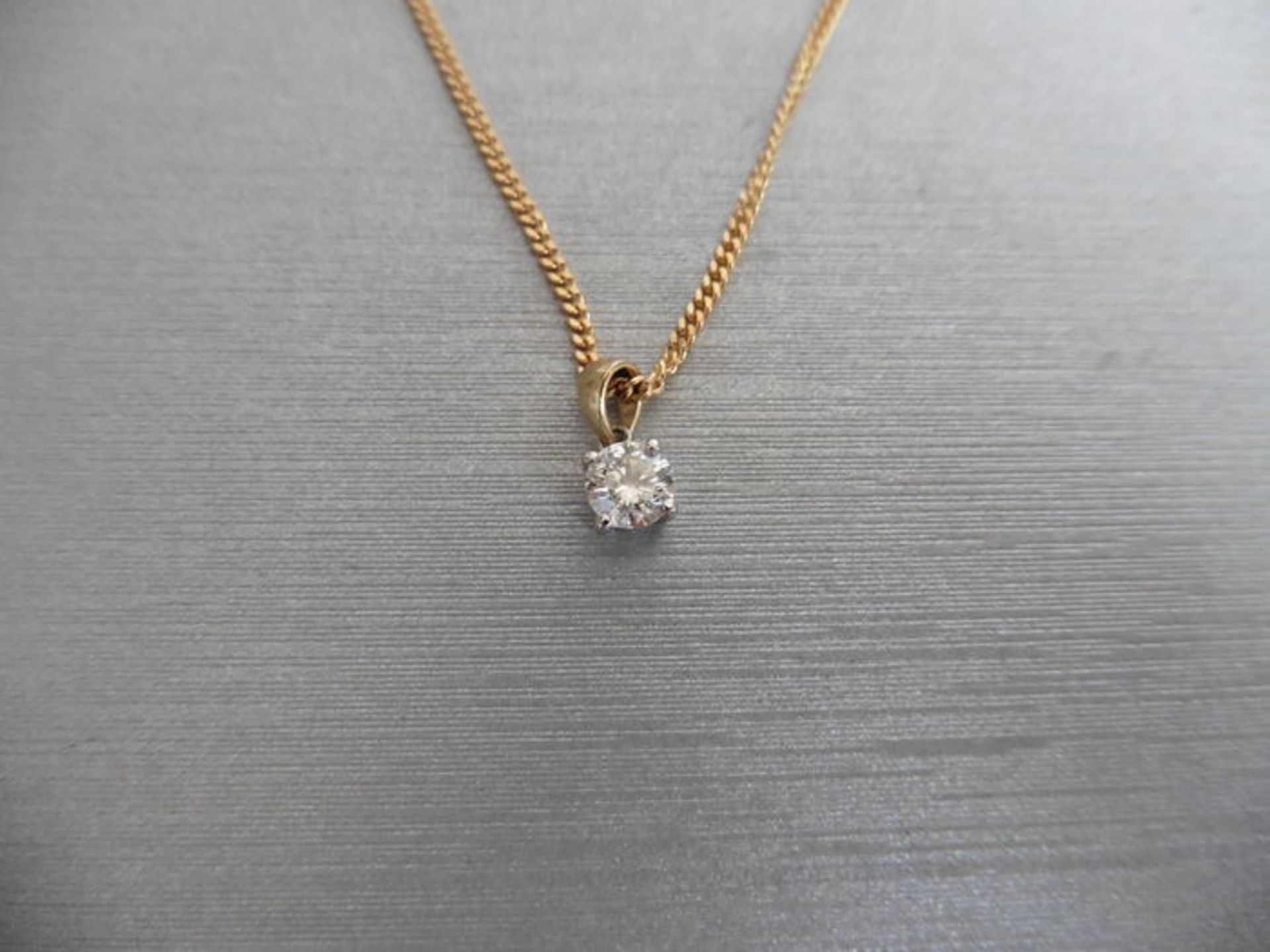 0.25ct diamond solitaire pendant set in 18ct gold. Brilliant cut diamond