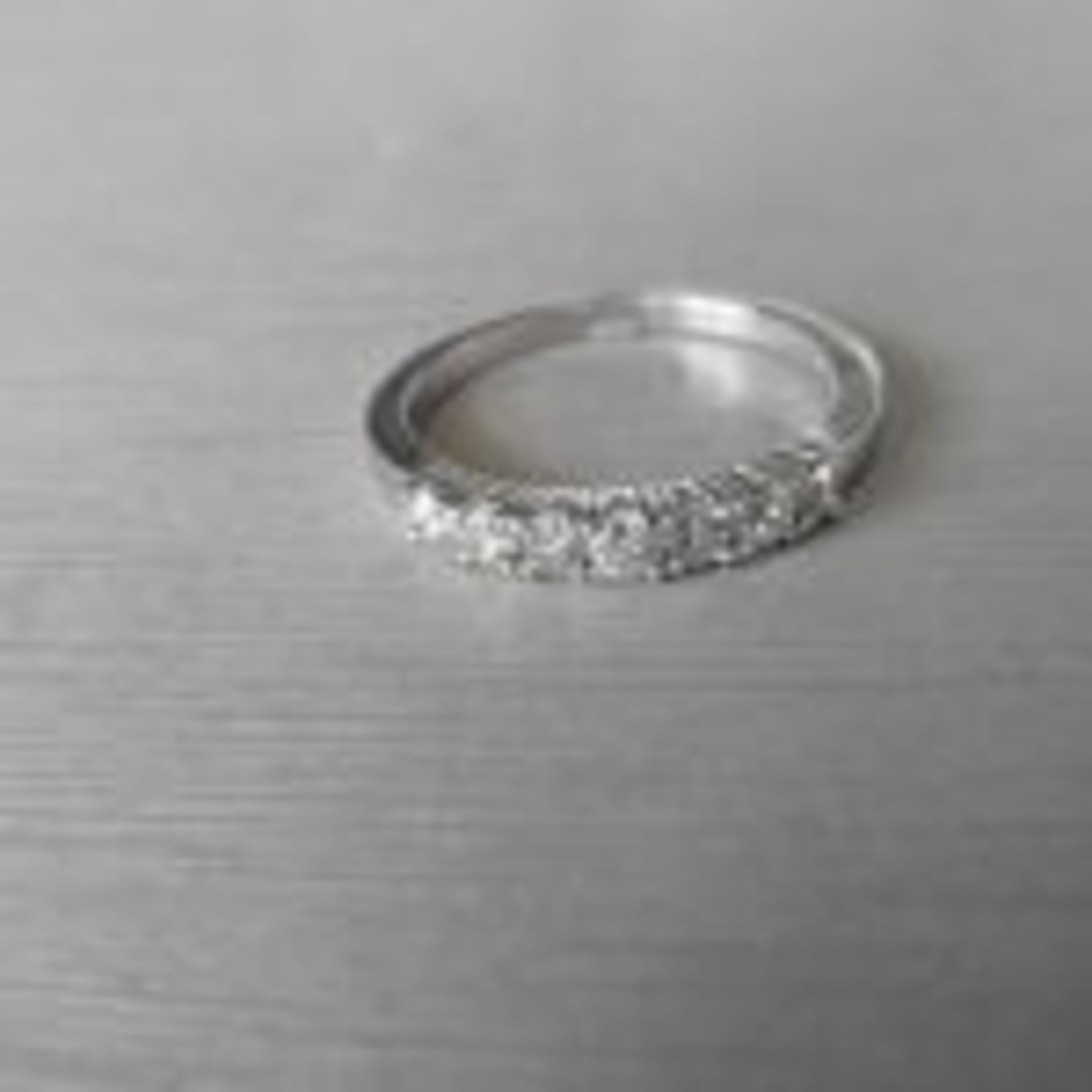 0.43ct diamond band ring. 7 brilliant cut diamonds - Image 2 of 3