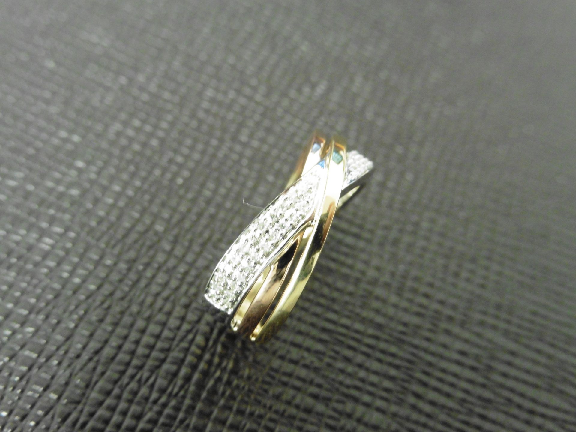 0.14ct diamond crossover band ring set in 9ct gold. - Image 4 of 4