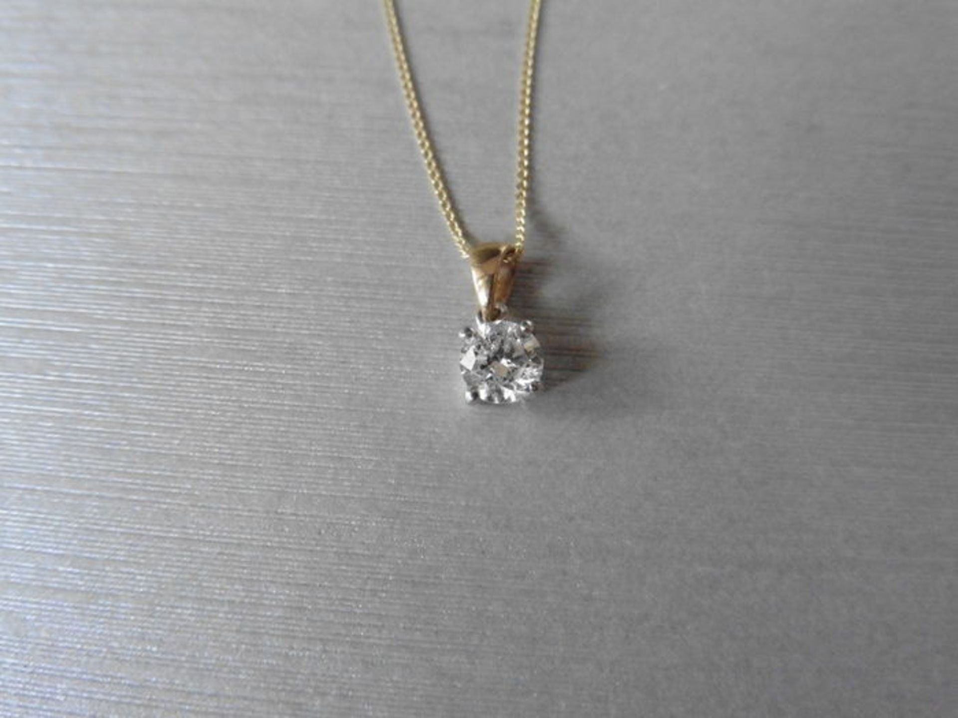 0.30ct diamond solitaire pendant set in 18ct gold. Brilliant cut diamond