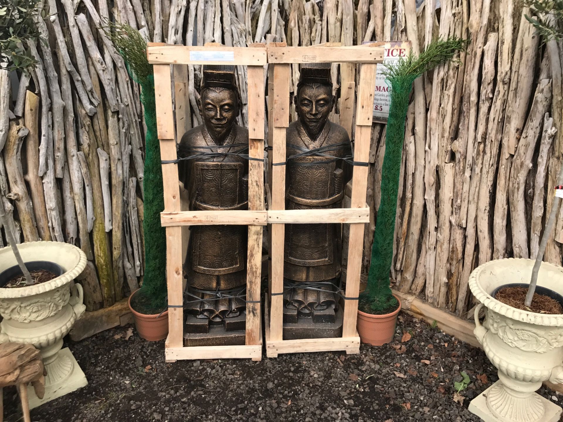 PAIR LARGE CRATED GUARDS IN BRONZE FINISH