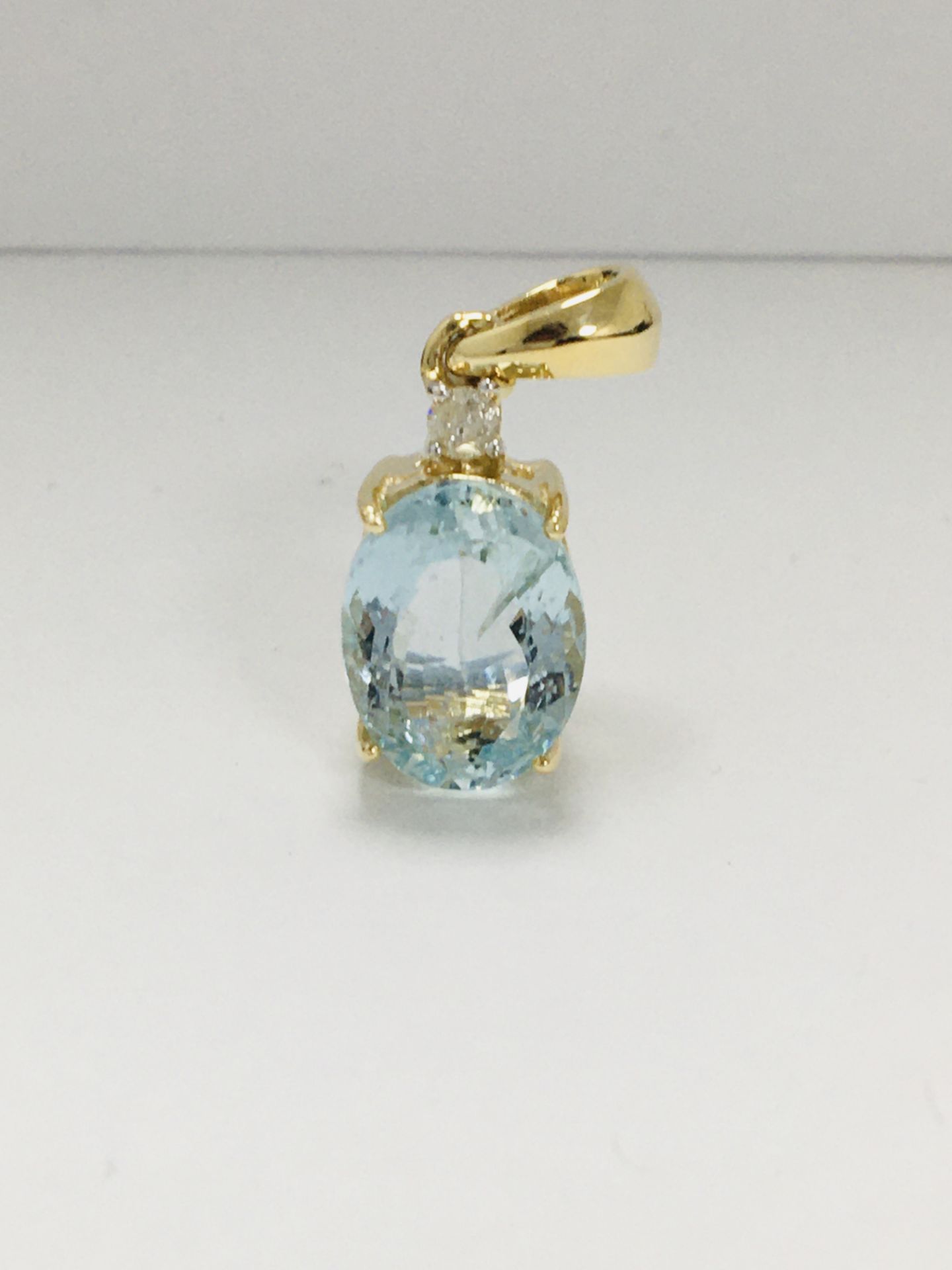 14Ct Yellow Gold Aquamarine And Diamond Pendant