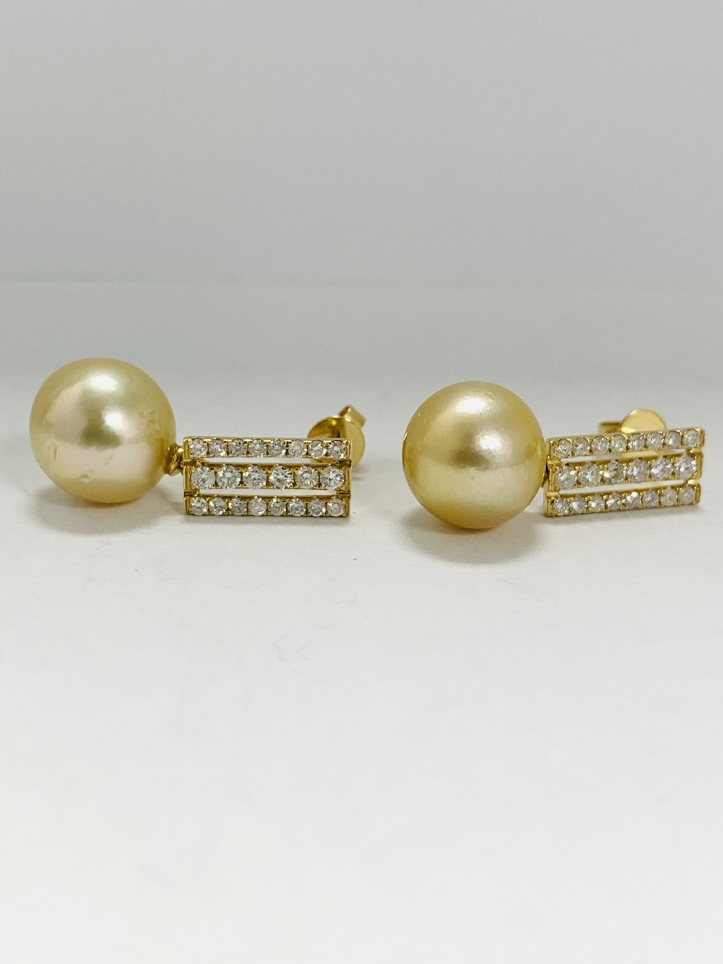 14K Yellow Gold Pair Of Earrings