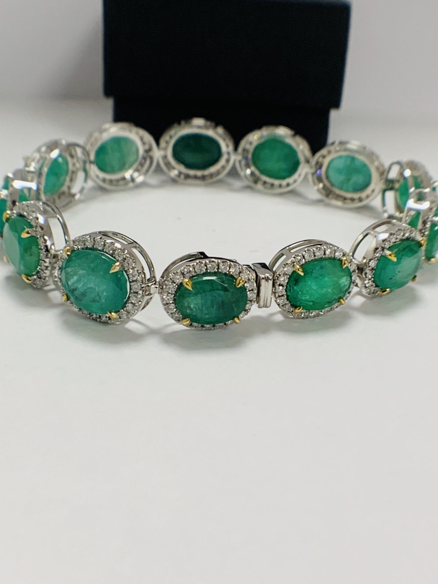 Platinum and Yellow Gold Emerald and Diamond Bracelet