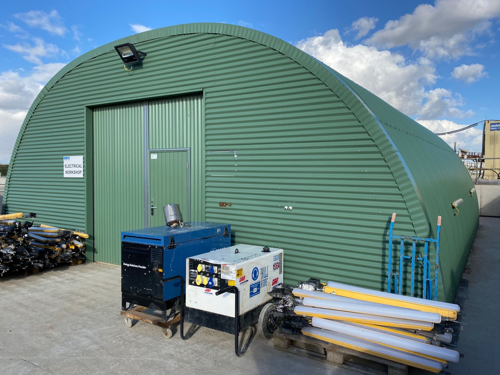 Nissen Hut, Corrugated Steel Hut with Clear Roof Panels, Double Entrance Doors One End and Single