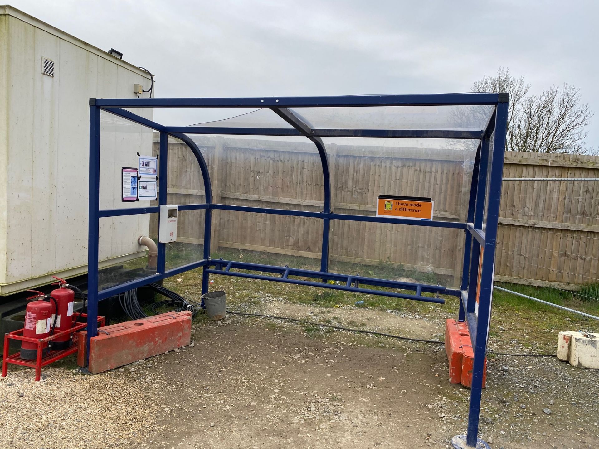 Smoking Shelter Blue Finished Steel Construction, Perch Rail Seat, with Clear Polycarbonate Panels