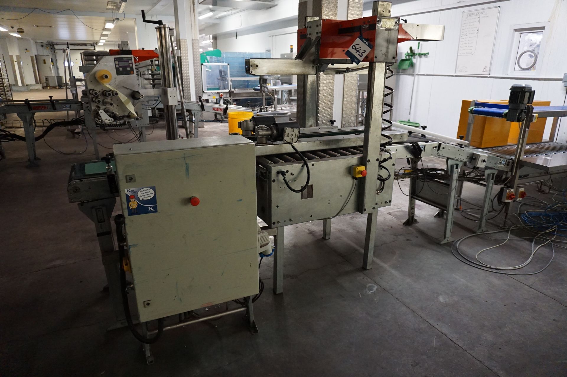 Soco System, Model: T402 box taping machine, Serial No. 101-2000 (2000) with infeed/outfeed