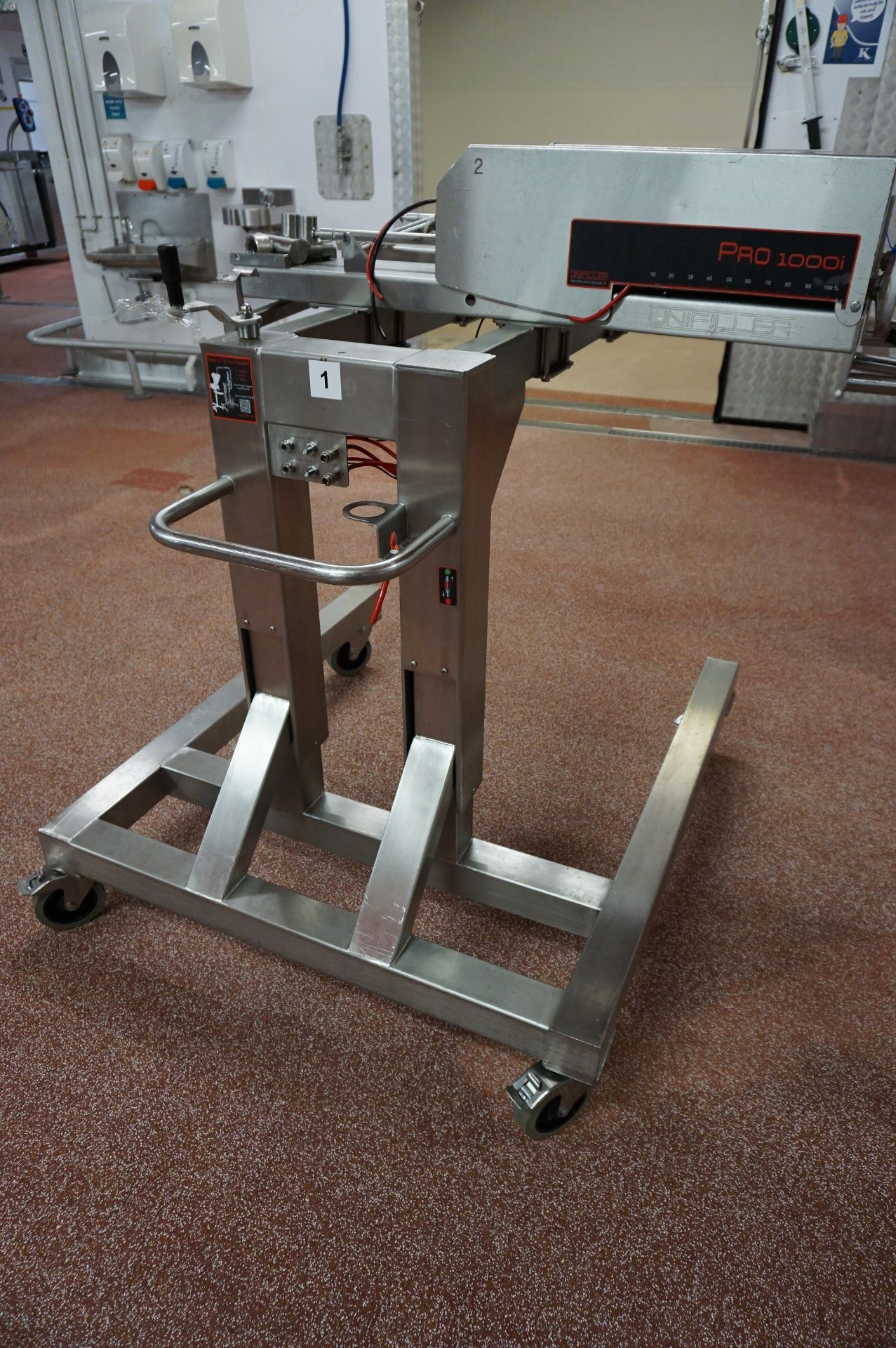 Unifiller, Model: PRO1000i, mobile twin lane depositor, Serial No. N/A with hopper infeed and