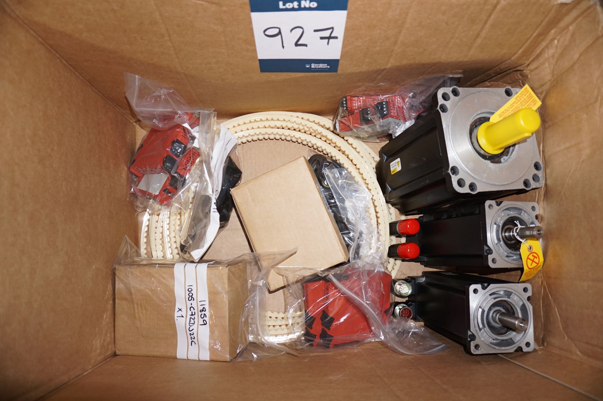 Box of bespoke Smurfit Kappa spares to include: safety relays, servo motors, vacuum cups etc., as