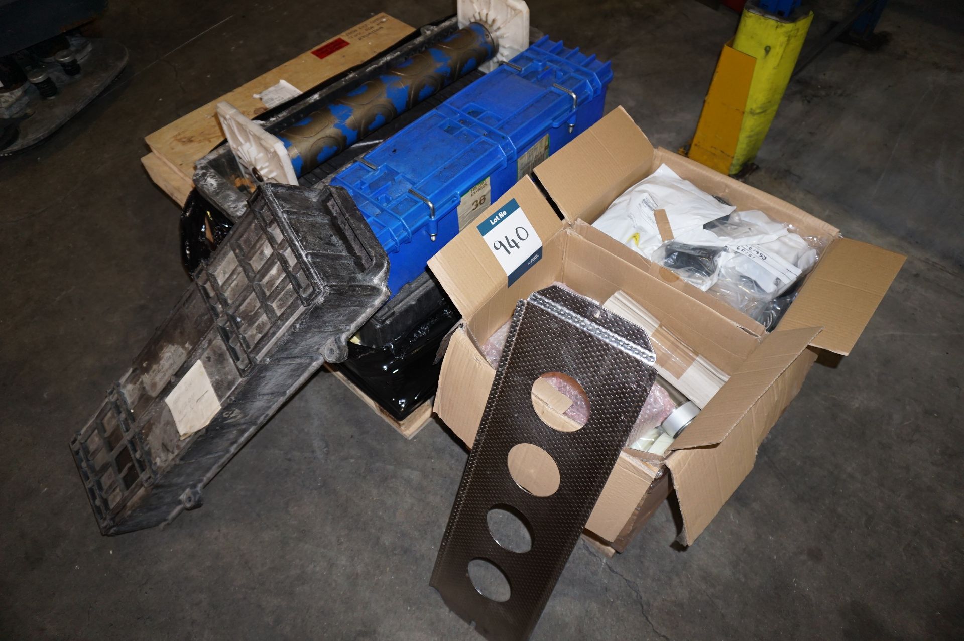 Pallet and boxes of BWI line spares to include: 4 lane current tooling, gear motors, cylinders,