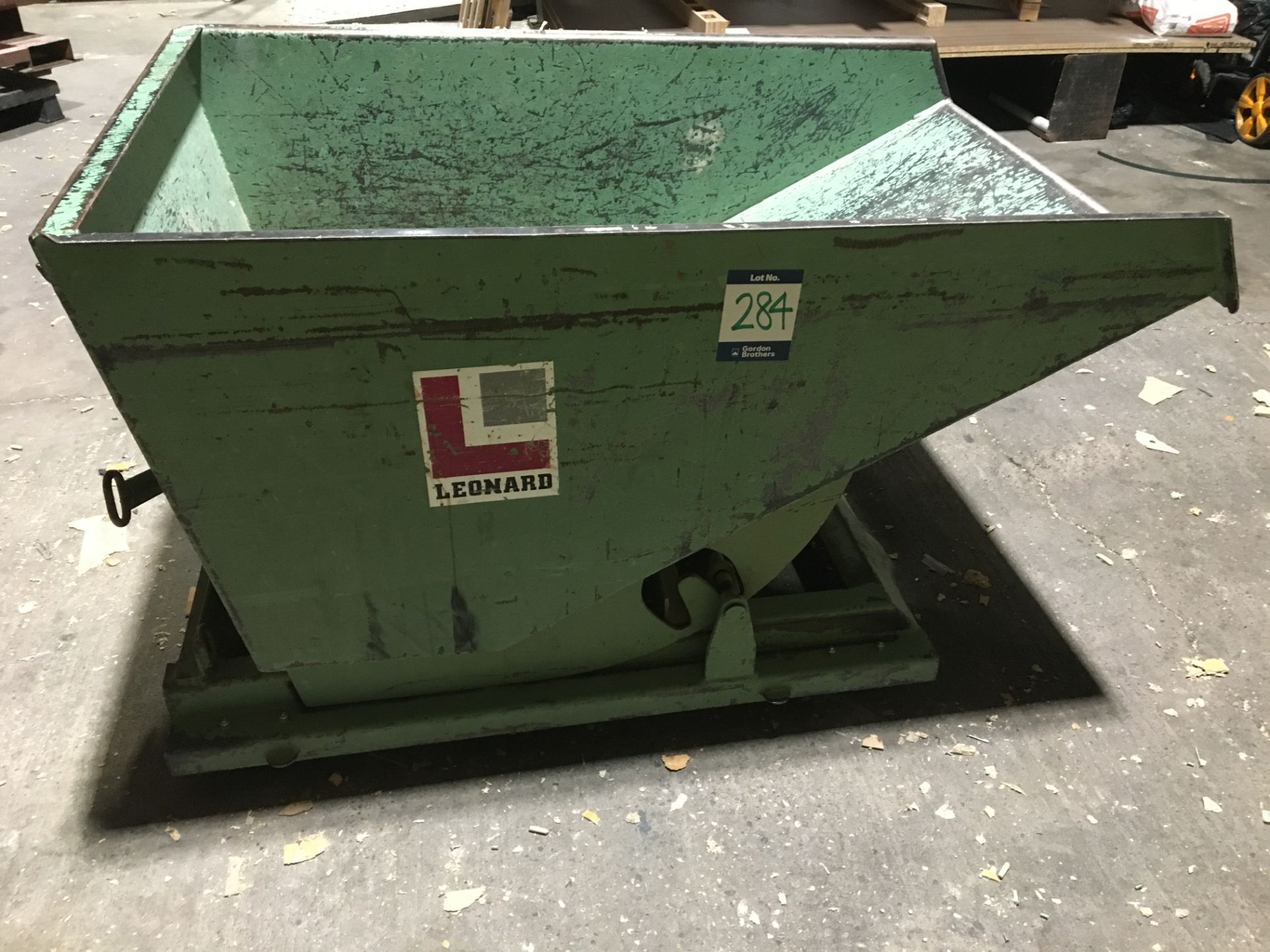 Leonard skid mounted tipping skip, loading size. 980mm x 1,520mm (Location: Brent)