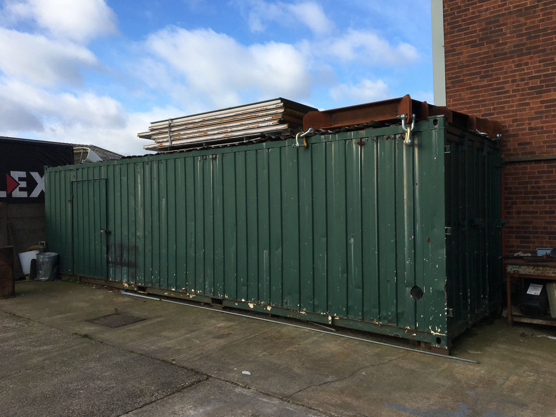 Steel 30' shipping container with pedestrian side door, electrics and extraction including