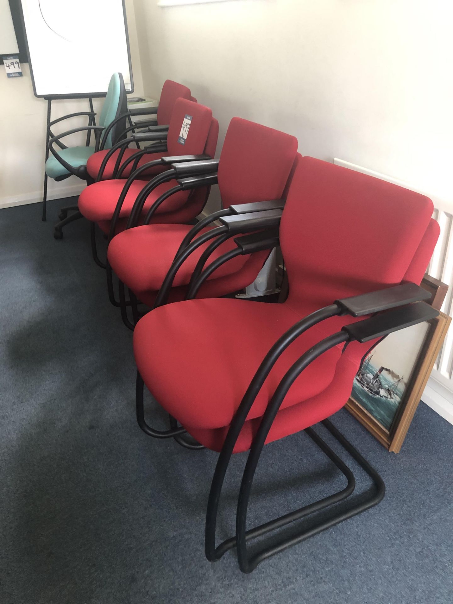 9 x red cloth upholstered metal framed armchairs