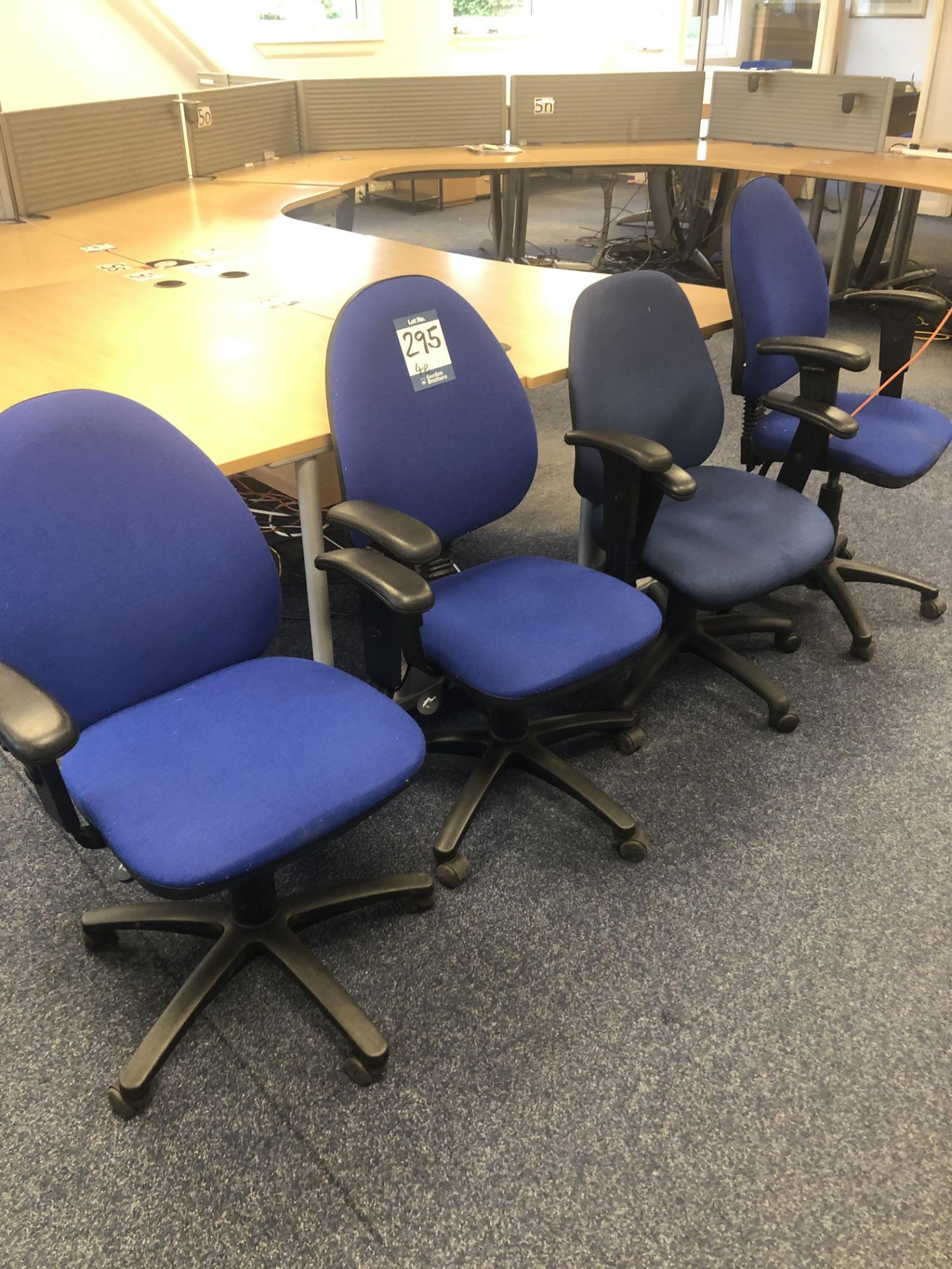 4x blue cloth upholstered operator chairs