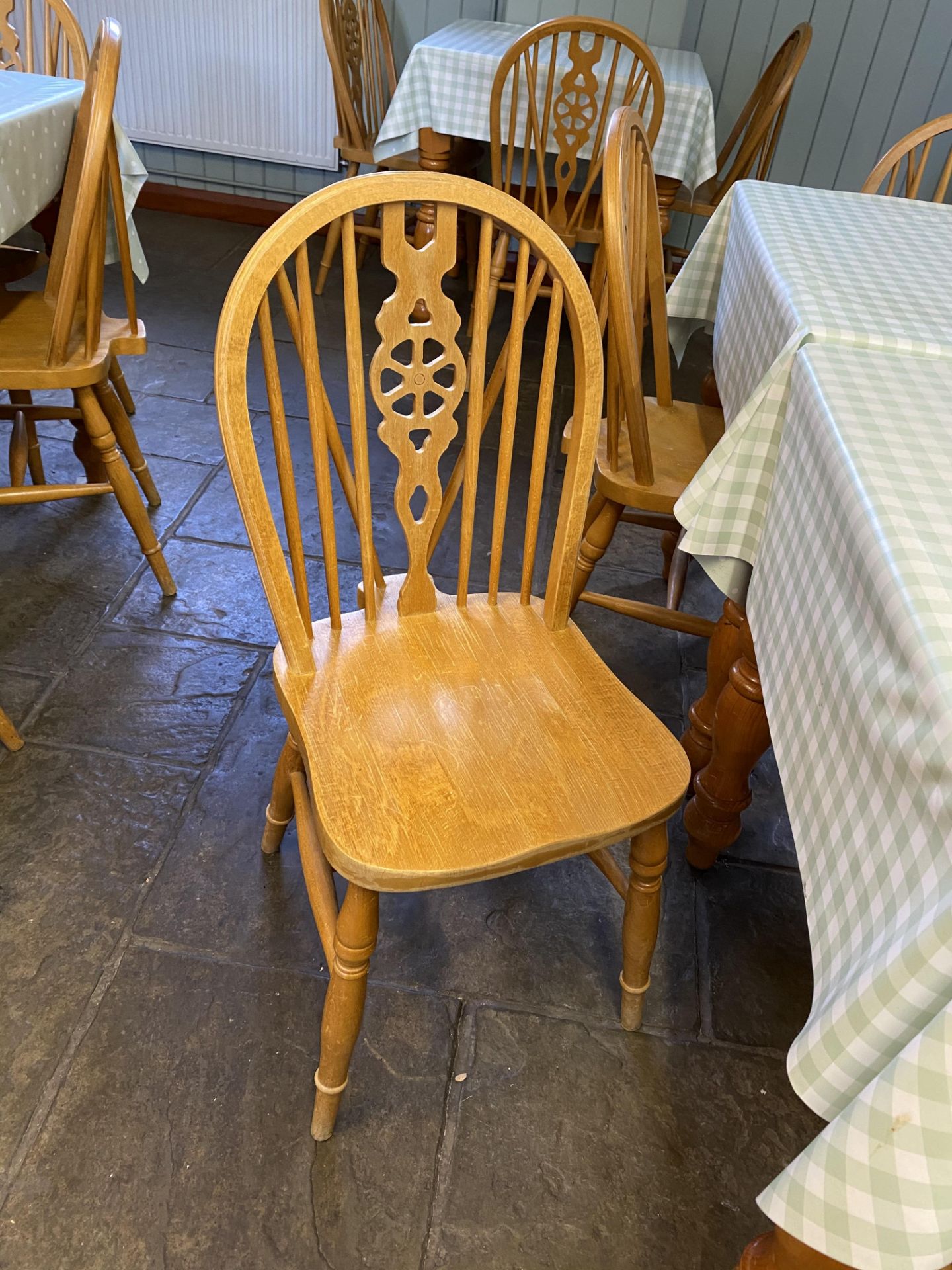 10 Pine square café tables and 26 wheel back dining chairs - located Visitor Centre Canteen - Image 3 of 4