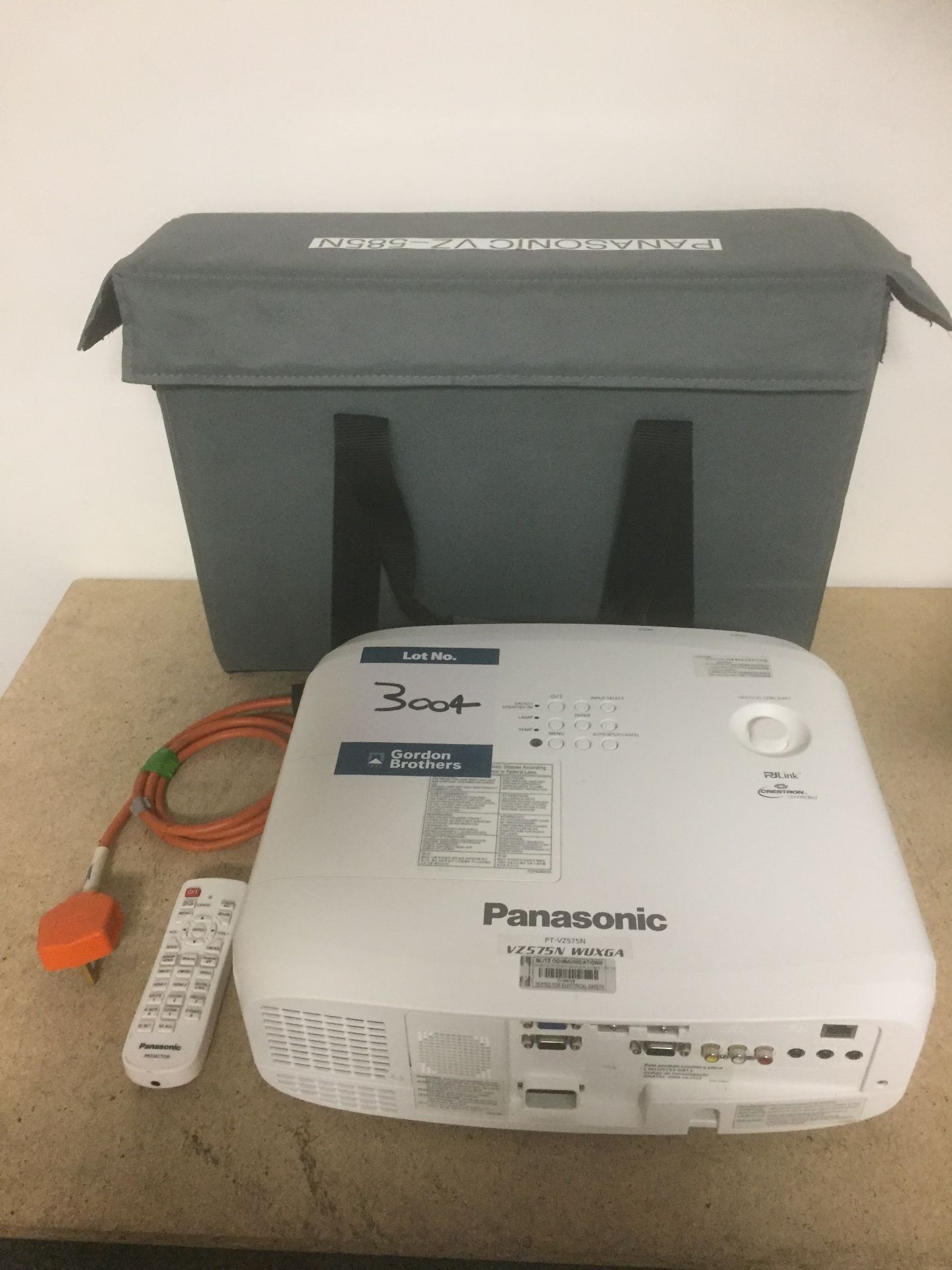 Panasonic PT-VZ575N WUXGA projector, including leads, remote and carry bag