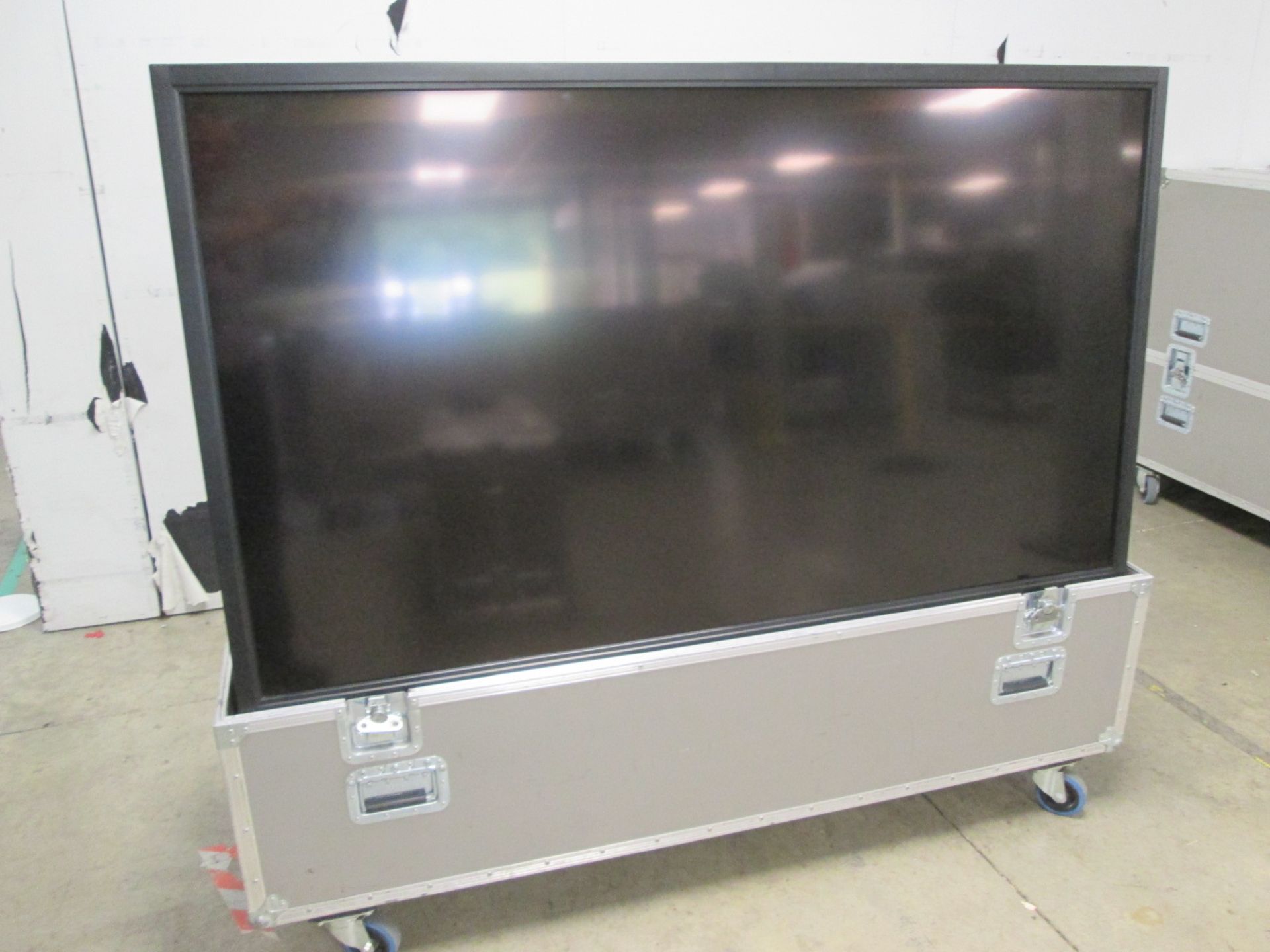 Sharp 70" LCD Colour Monitor, Model PN-E702, S/N 4C000536, In flight case with backplate and remote