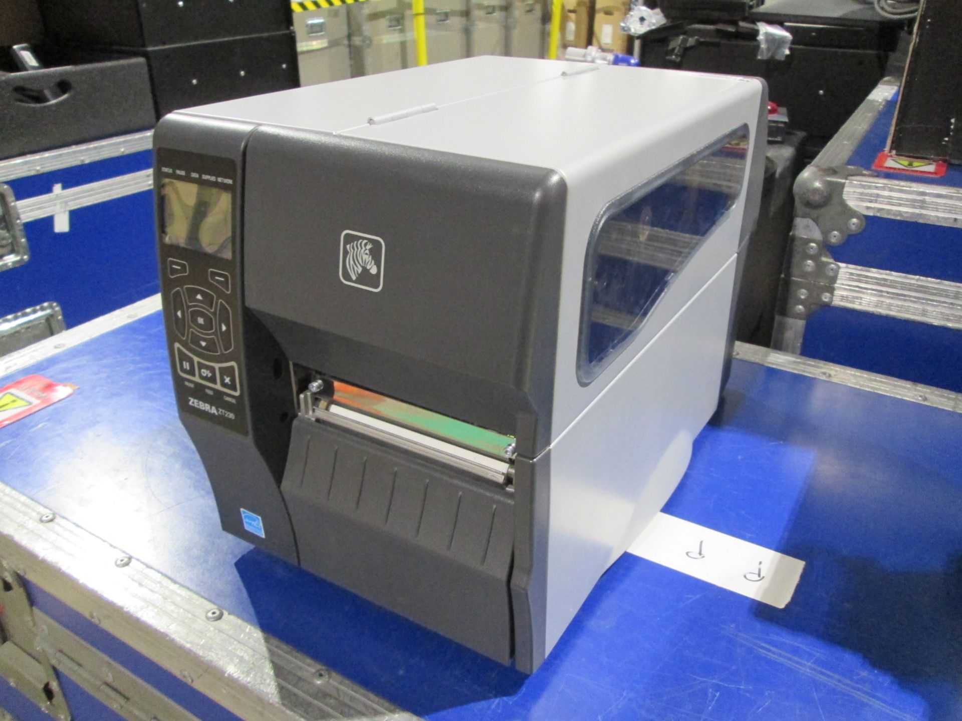 Zebra ZT230 Thermal Label Printer. S/N 52J122300427. In flight case