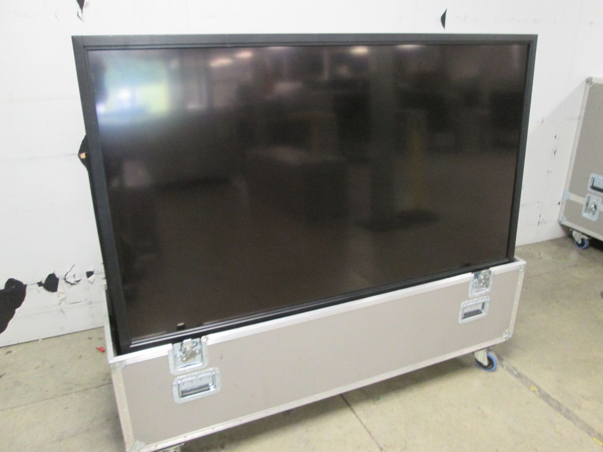 Sharp 70" LCD Colour Monitor, Model PN-E702, S/N 4C000589, In flight case with backplate and remote