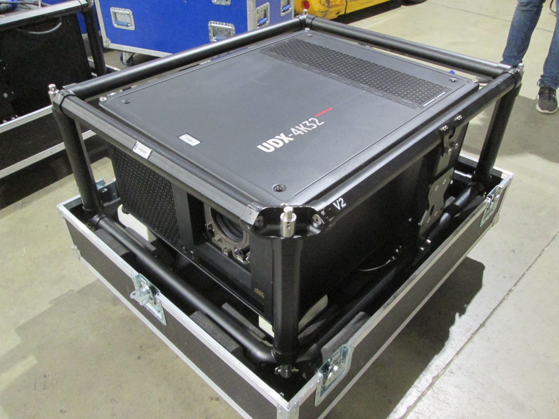 Barco BME UDX 4K32 FRM+FC Laser Projector. S/N R9008600-FC2590127930. In flight case with hanging br