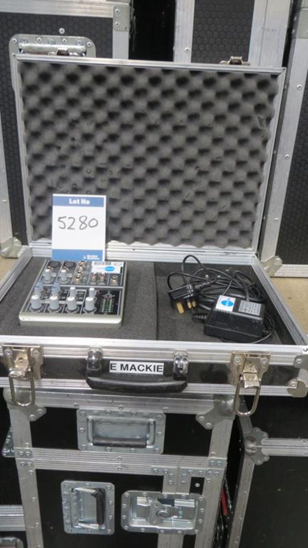 Mackie, four channel mixing desk in transit case,