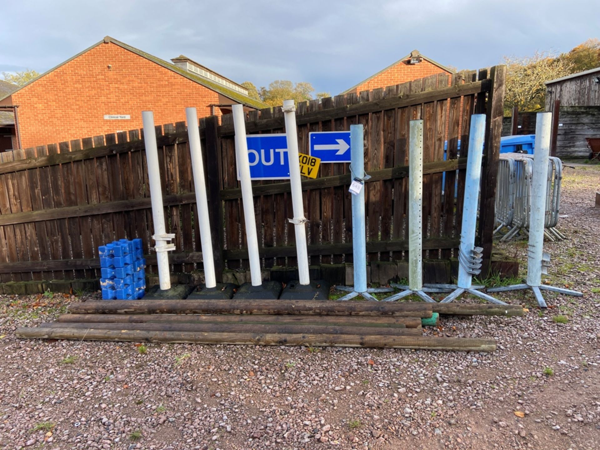 Eight horse show jumping poles and 9x No. timber crossbeams