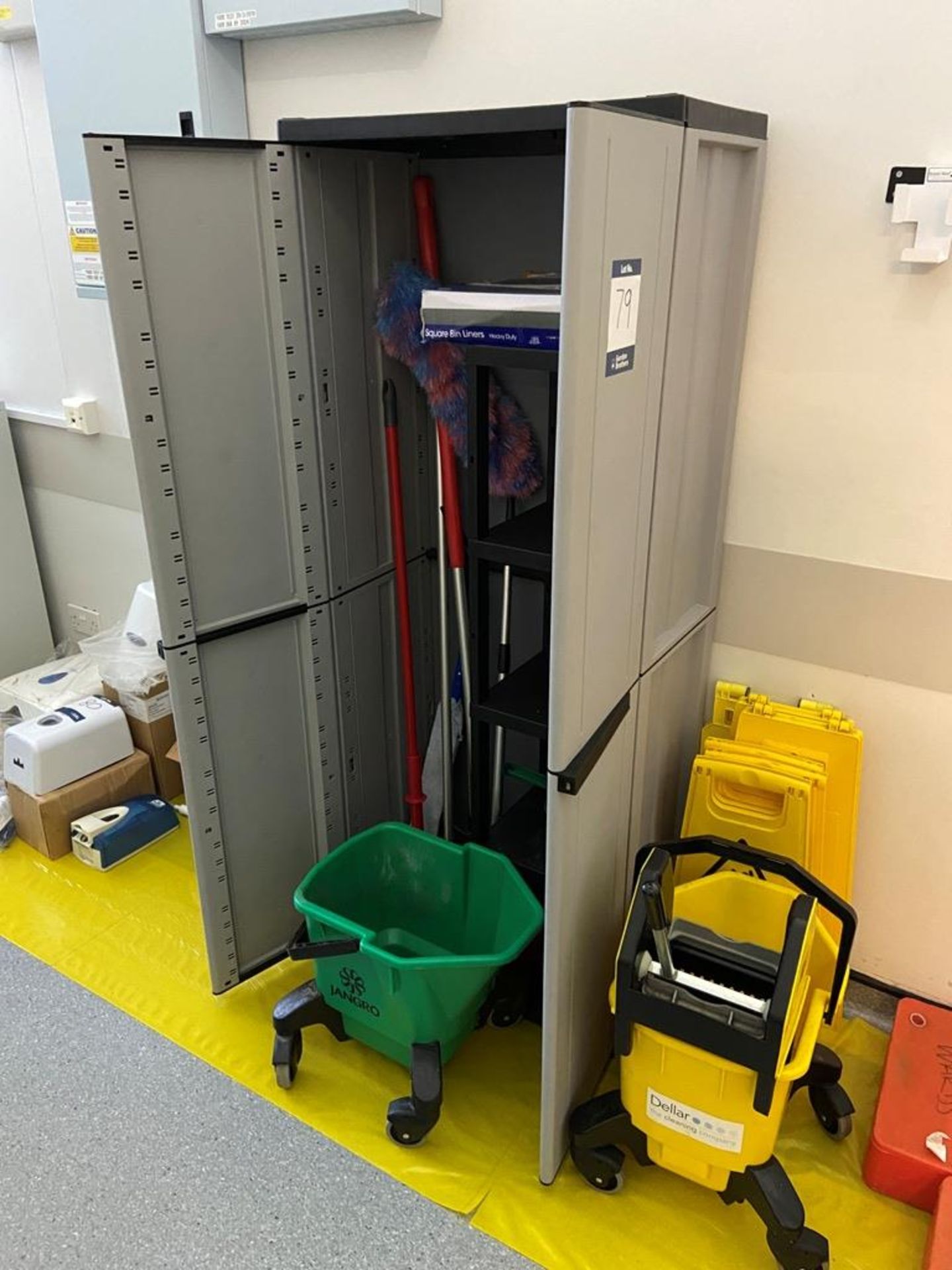 Plastic cleaning storage cupboard with contents comprising: 2x No. mop buckets, 6x No. hazard signs,