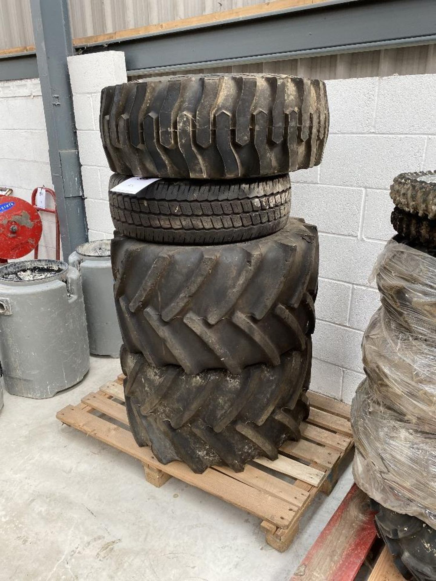 A Pallet of Various Sized Tyres