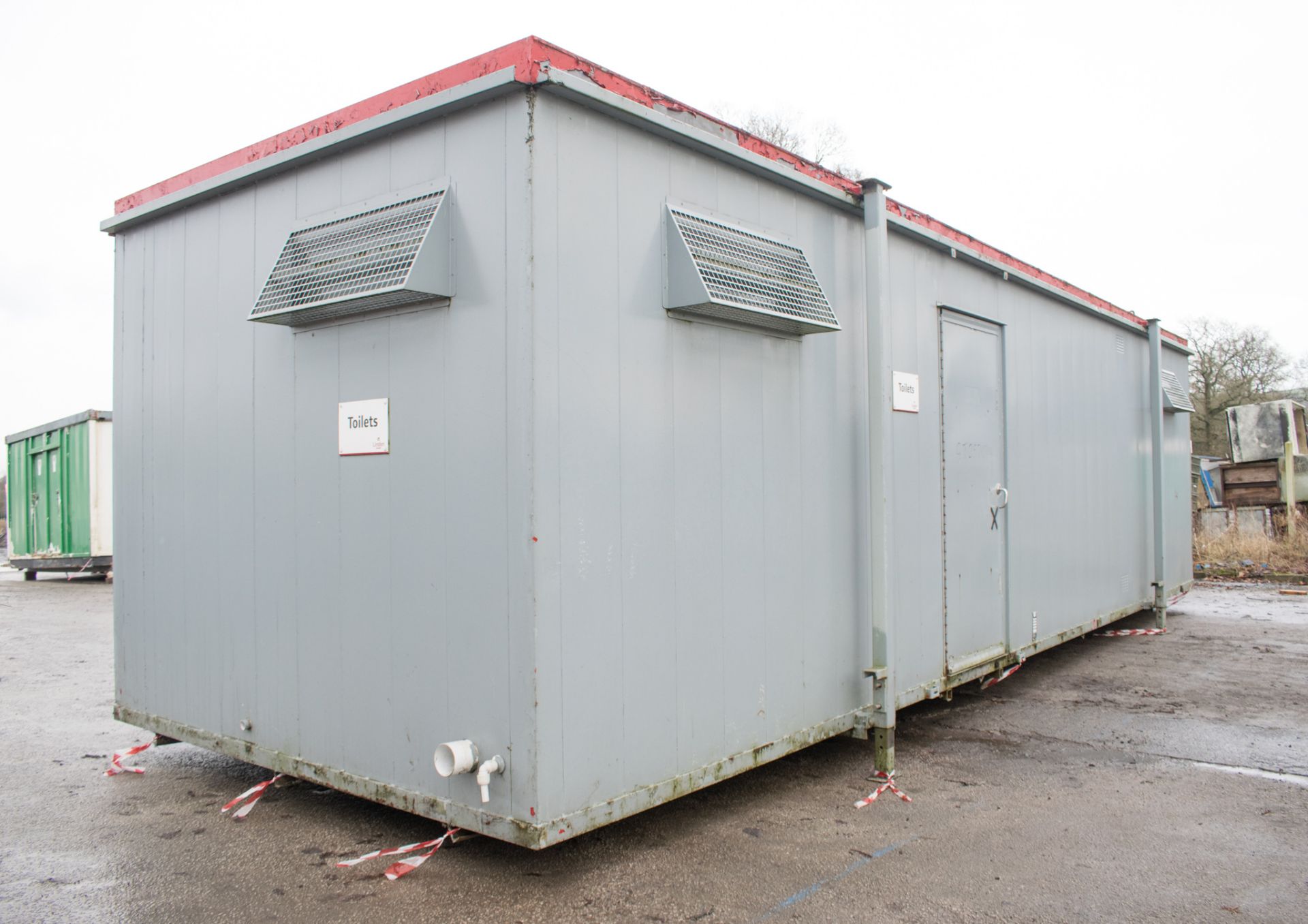 32 ft x 10 ft steel anti-vandal jack leg toilet unit Comprising of: Lobby, 4 urinals, 4 toilets, 4