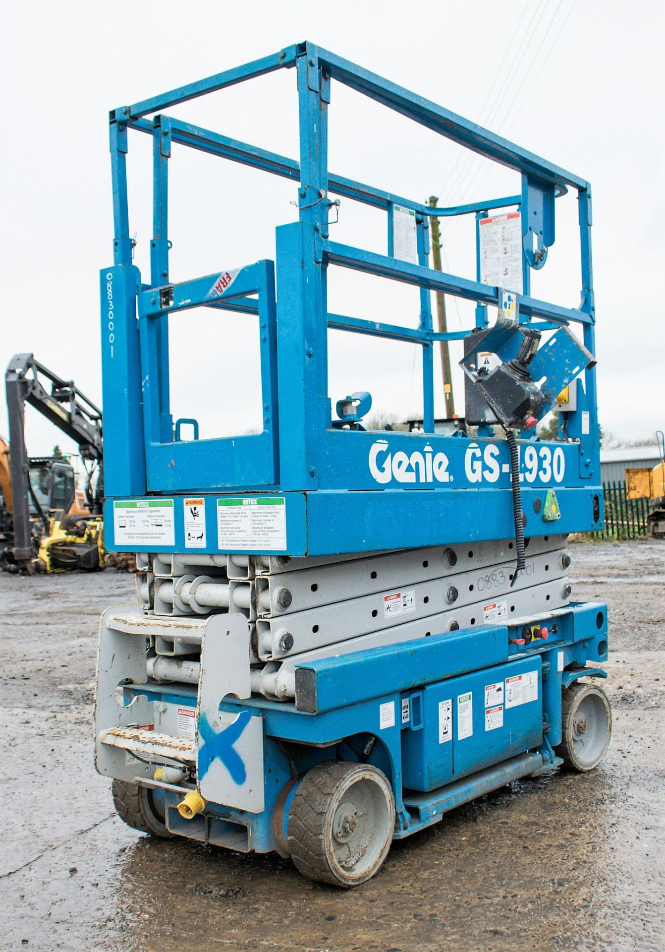 Genie GS1930 battery electric scissor lift Year: 2002 S/N: 53599 Recorded Hours: 347 0883-0001