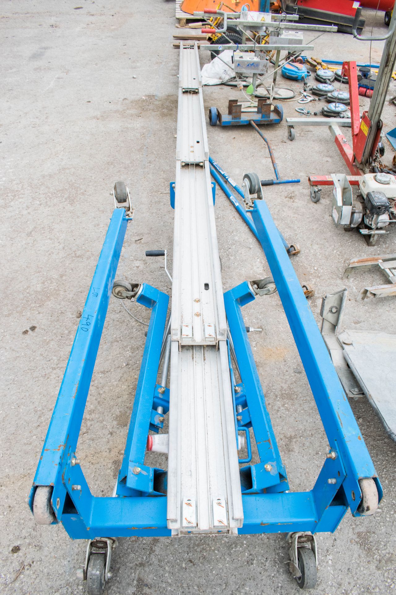 Genie SLA-25 manual material hoist  c/w forks