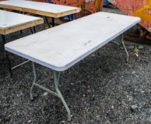 Trestle plastic table