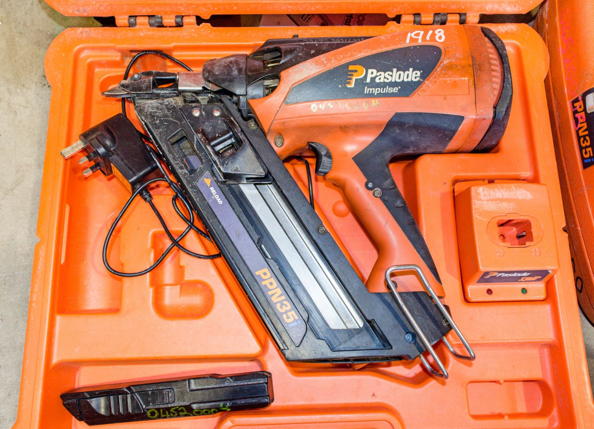 Paslode Impulse PPN 35i cordless nail gun c/w charger, battery & carry case