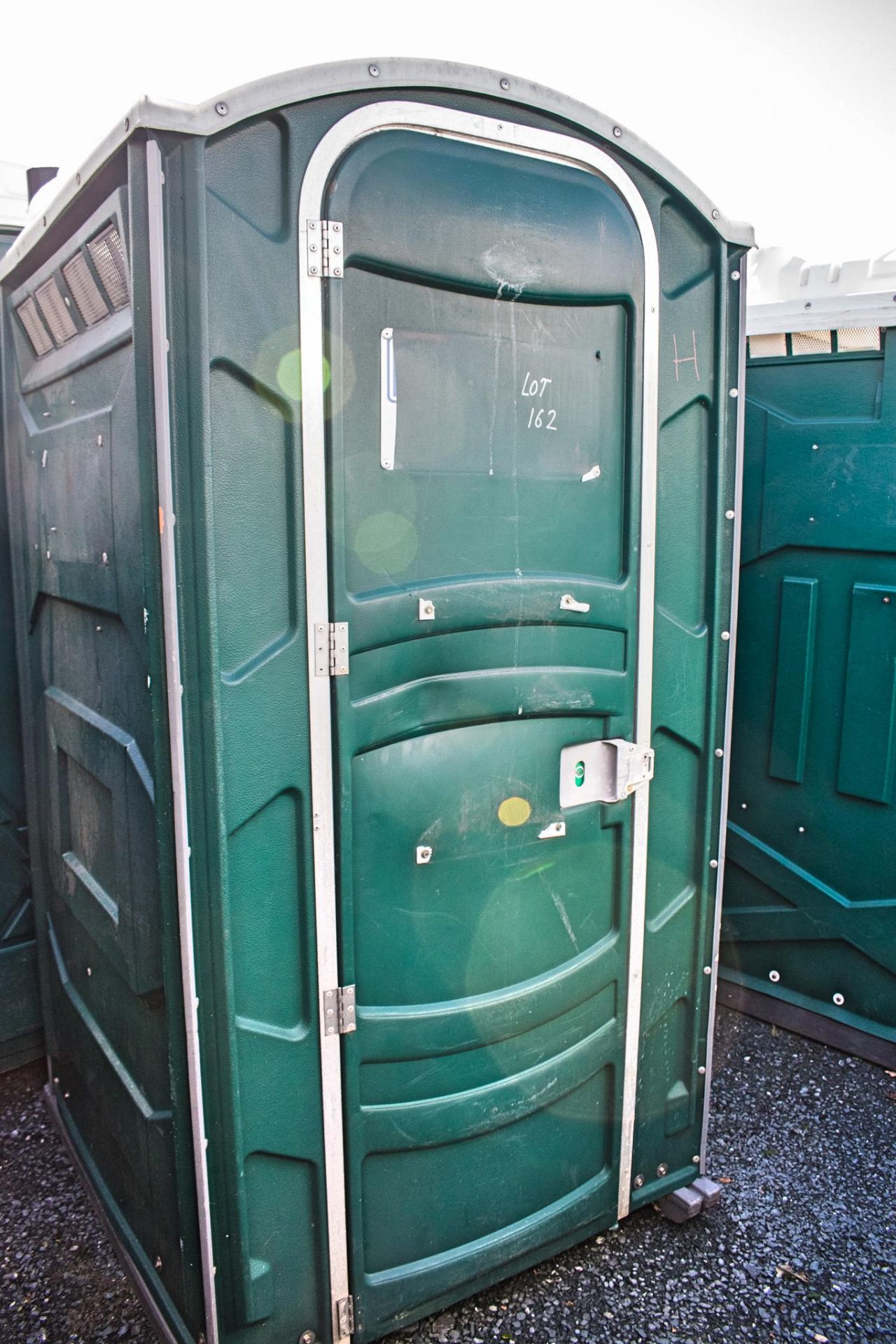 Portable plastic toilet unit ** Holes drilled in tank **