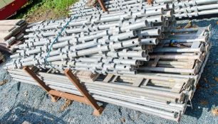 Stillage of steel quickform scaffolding uprights and crossbeams as photo'd