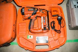 Paslode Impulse nail gun c/w charger & battery ** No battery **