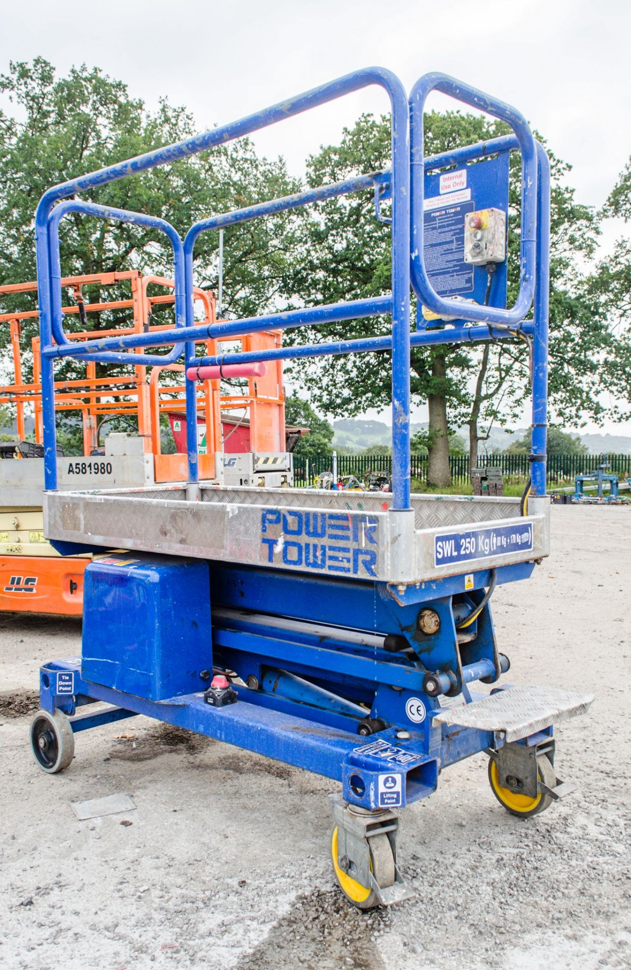 Power Tower push around battery electric scissor lift Year: 2008 S/N: 4110908A 08P10002