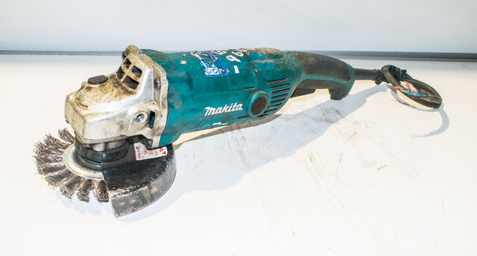 Makita 110v 125mm angle grinder CO