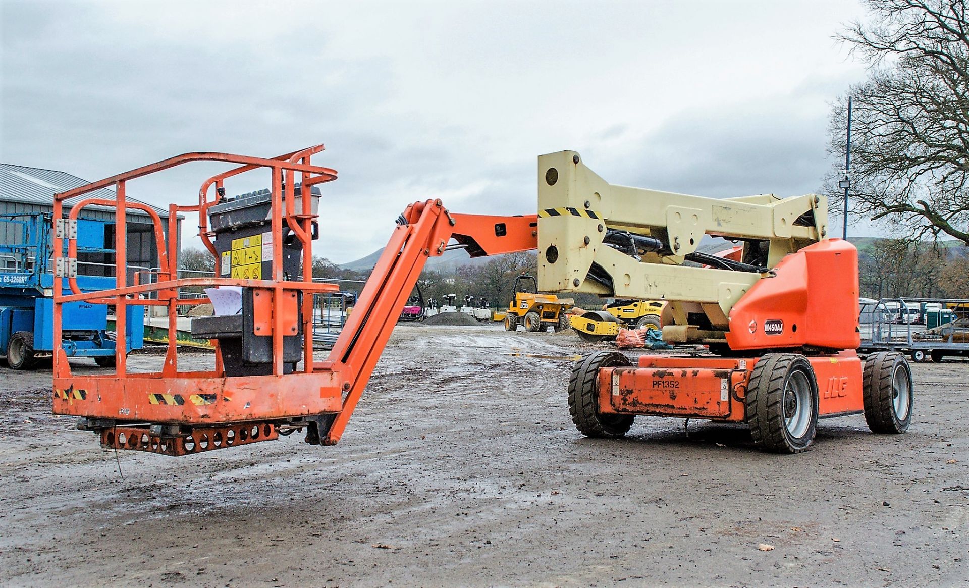 JLG M450AJ battery/diesel articulated boom access platform Year: 2011 S/N: 150483 Recorded Hours: