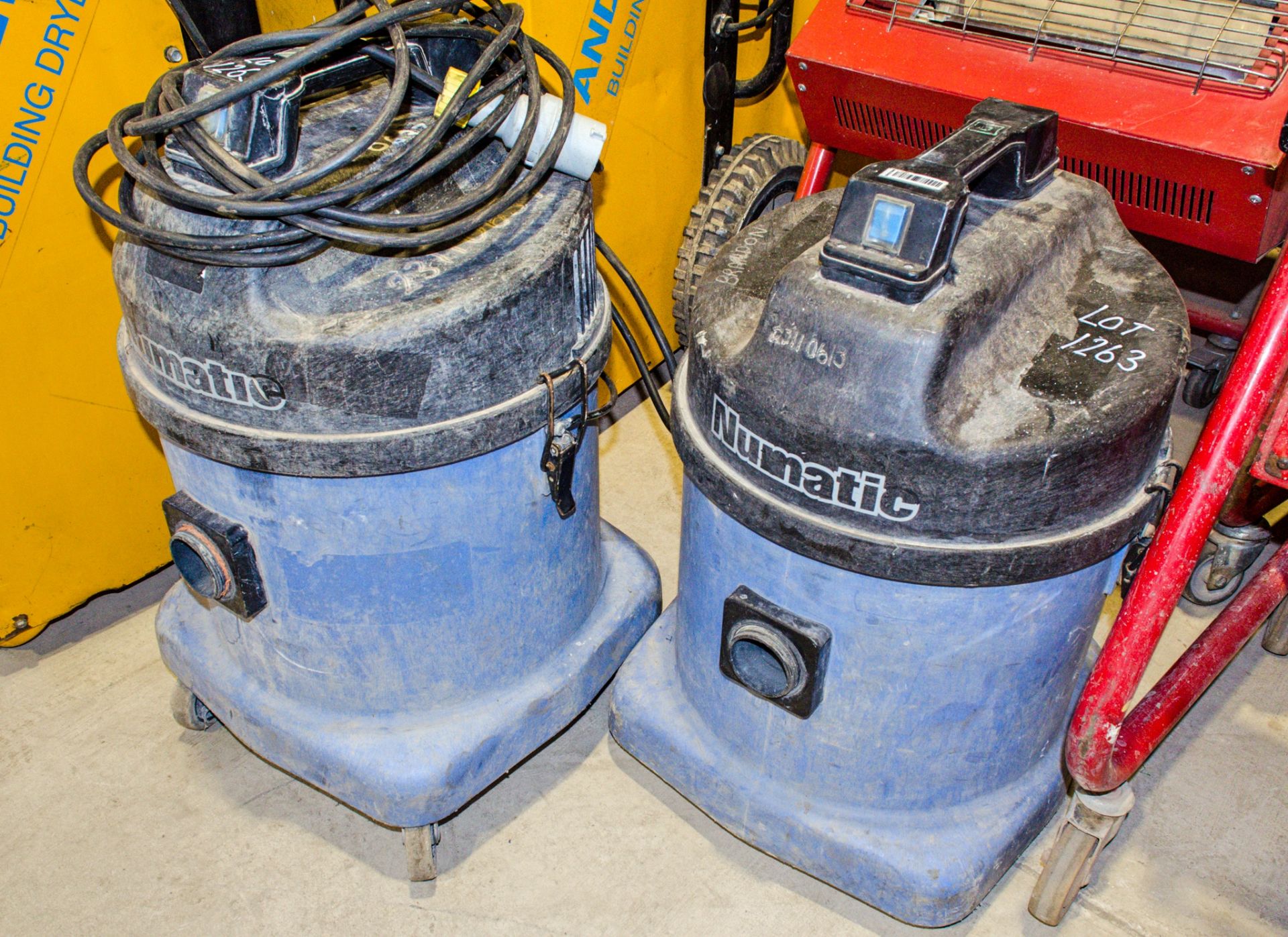 2 - Numatic 110v vacuum cleaners ** 1 with cord cut off & both with no hoses **