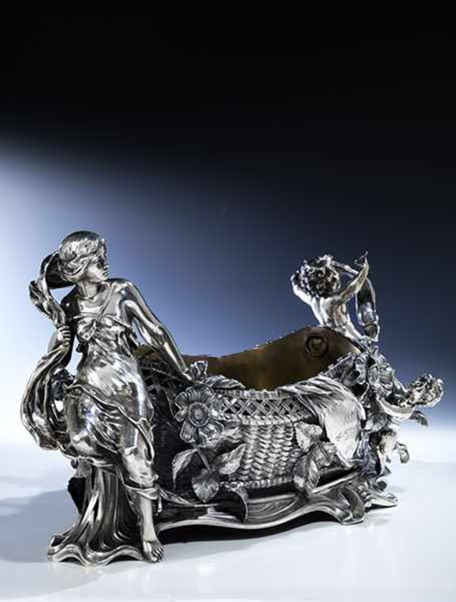 Magnificent silver centrepiece basket with figures