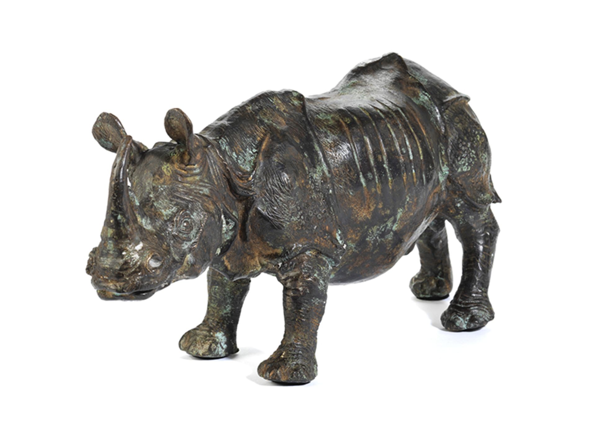 Bronzefigur eines Rhinozeros Höhe: 17 cm. Länge: 34 cm. Unsigniert. Standfigur mit leicht - Bild 2 aus 4