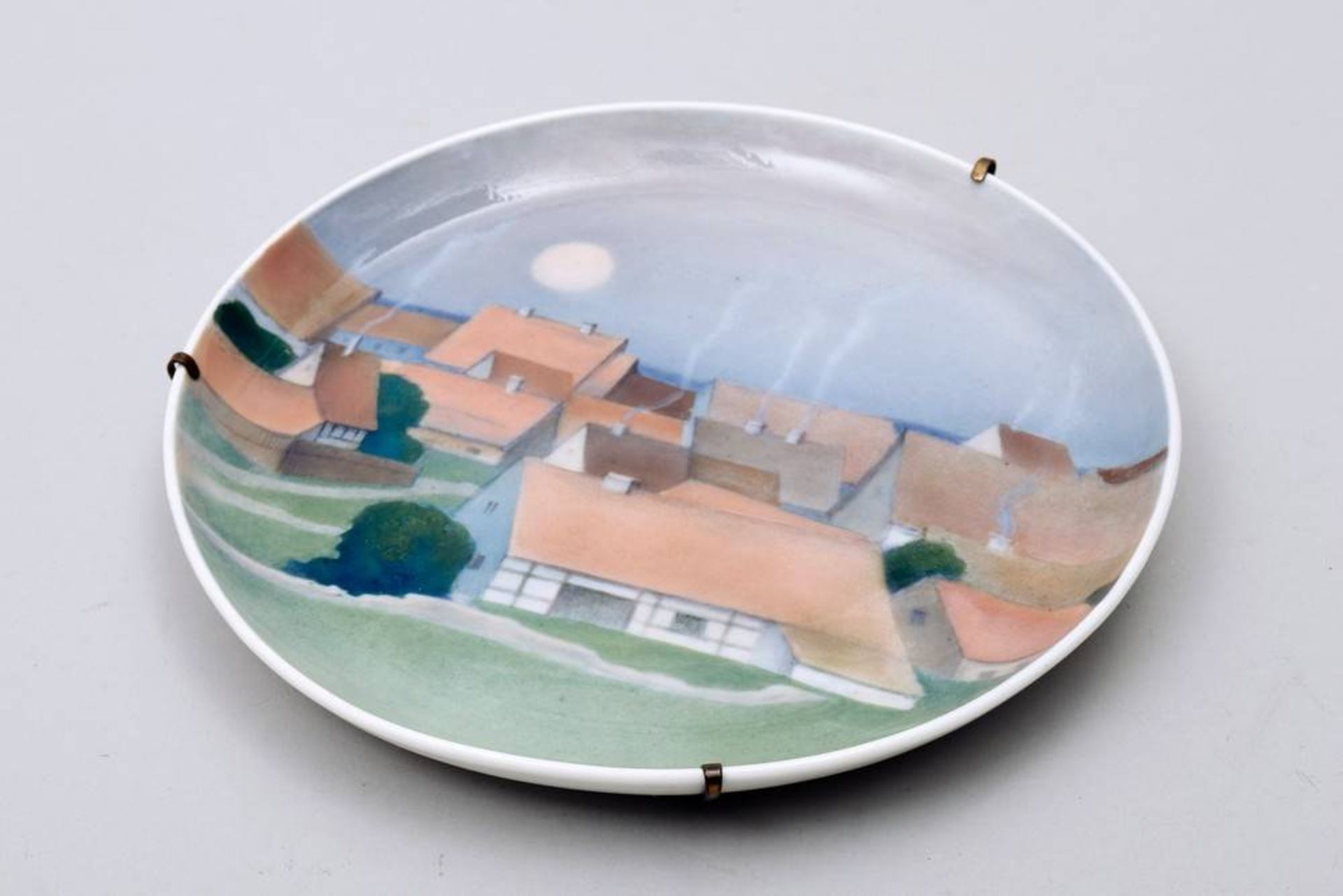 Small wall plate Meissen, 1st half 20th C., view of a village, painted in underglaze colours,