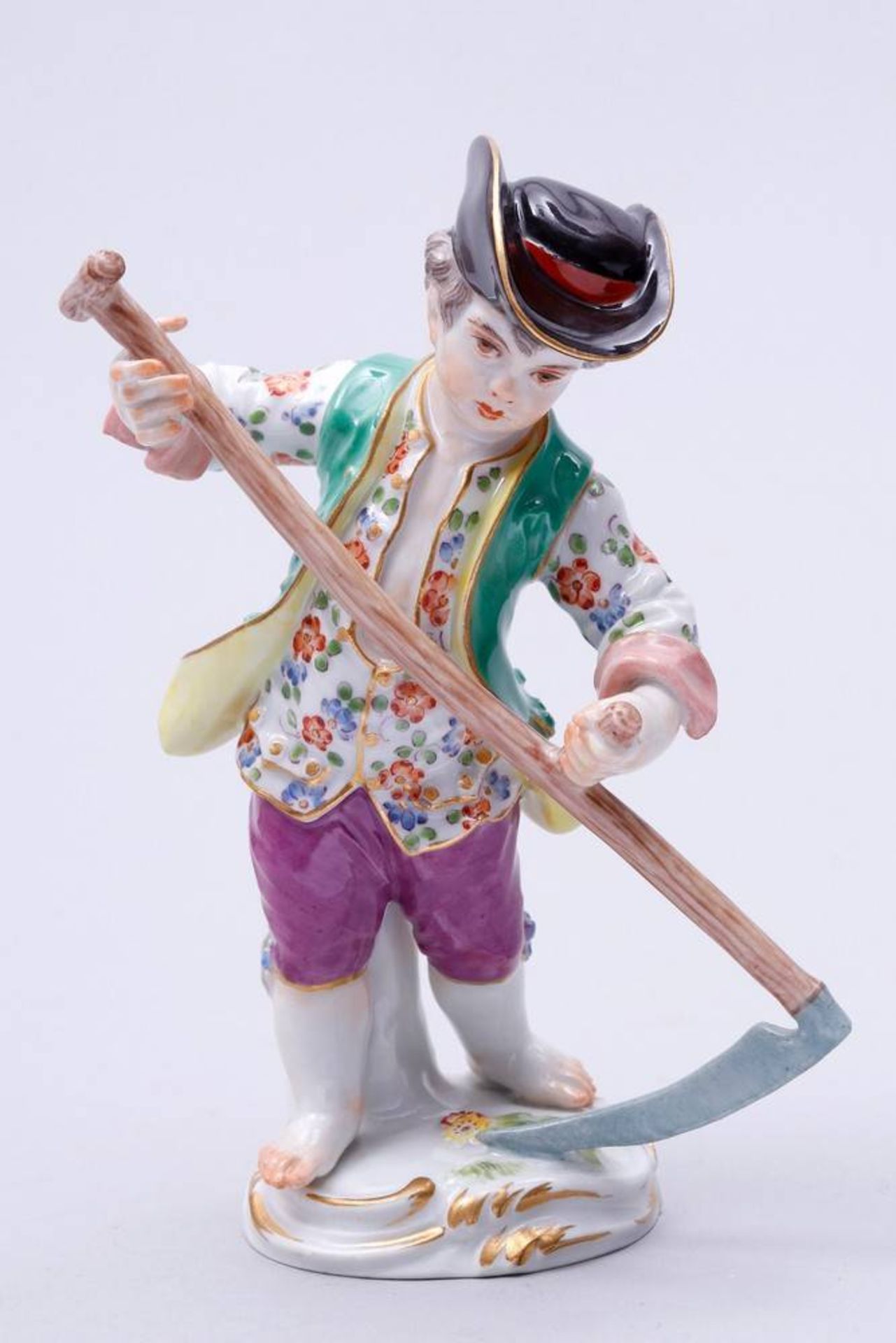 Young Gardener Meissen, 2nd half 20th C., standing boy with scythe, porcelain, painted in colours,