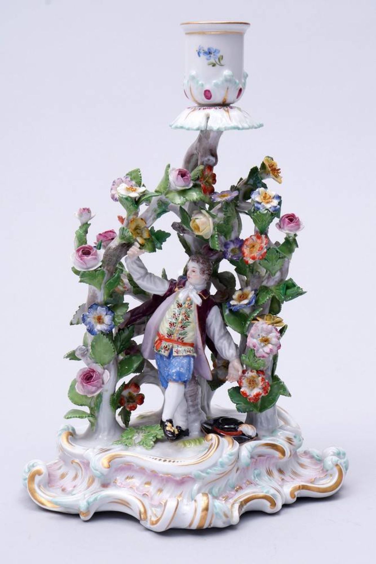 Figural Candlestick Meissen, ca. 1900, dancing man between flowering shrubs, porcelain, painted in