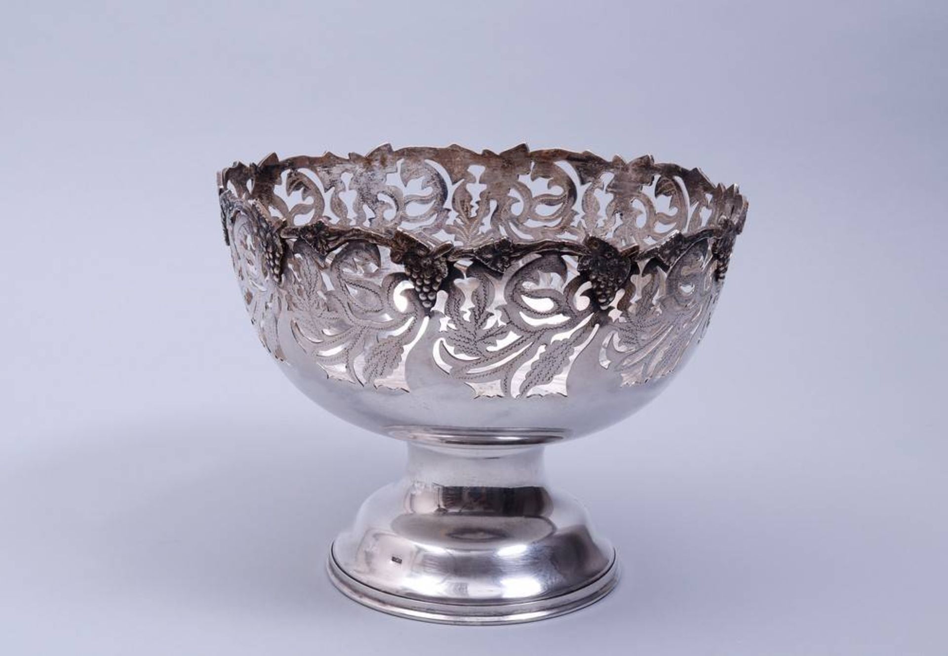 Large footed bowl silver, Egypt, mid 20th C., floral and vine decoration, ca. 1058g in total, HxD: